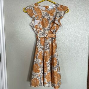 Girls summer dress. Gold, brown, cream. Size 10-12.